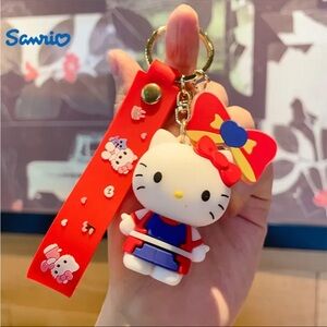 Sanrio Hello Kitty Keychain with Red and Yellow Bow
